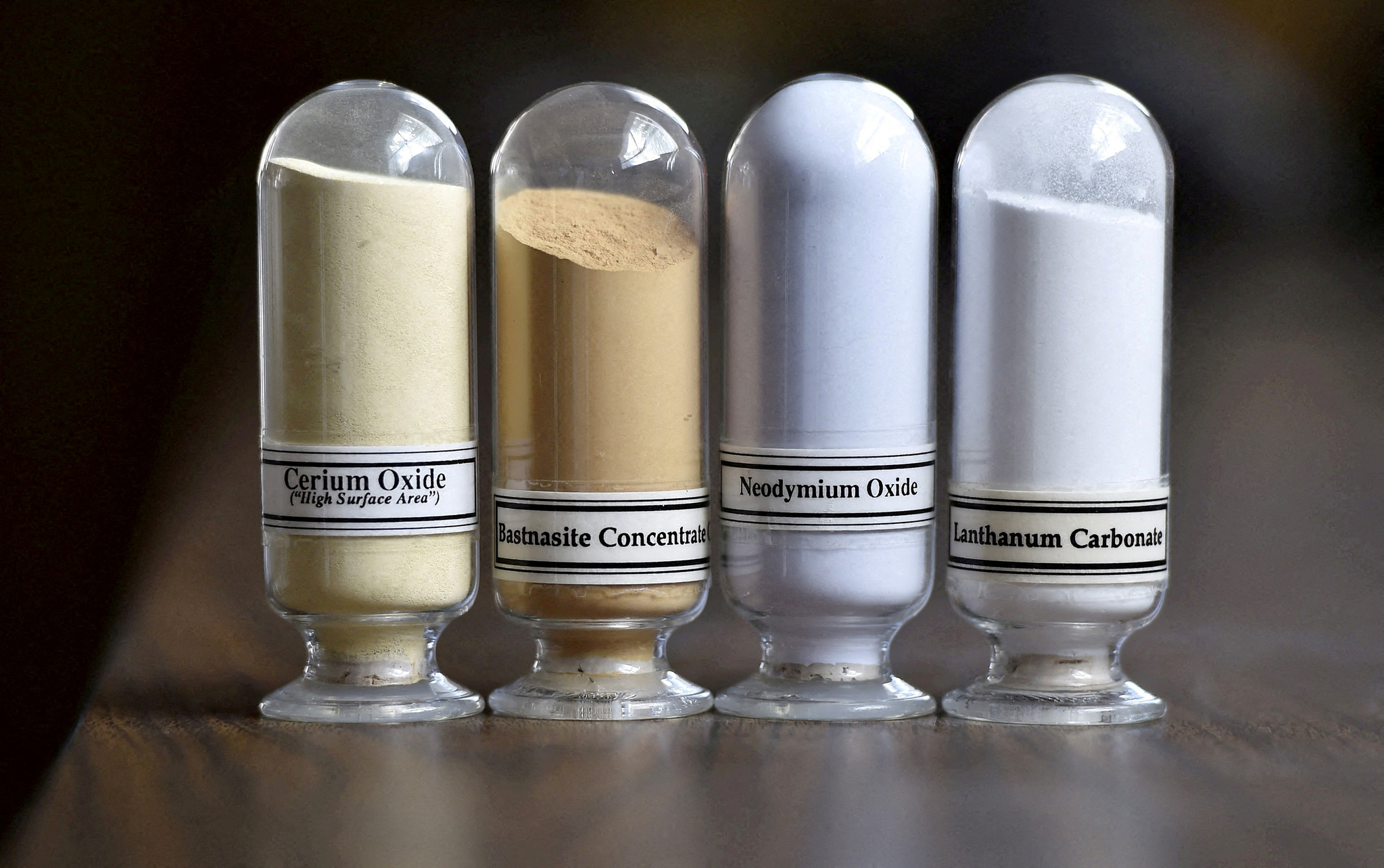 Samples of rare earth minerals from left, cerium oxide, bastnasite, neodymium oxide and lanthanum carbonate are on display during a tour of Molycorp's Mountain Pass Rare Earth facility in Mountain Pass, California, June 29, 2015. [REUTERS/YONHAP]