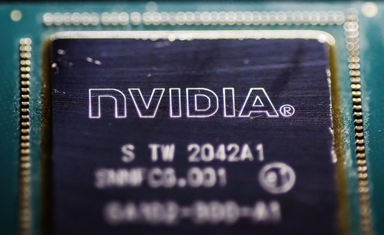 A photo illustration shows a discarded chip by U.S. technology company Nvidia on July 23. [EPA/YONHAP]