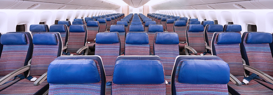 The photo shows the economy cabin of Korean Air’s 777-300ER in a 3-3-3 configuration. [KOREAN AIR]