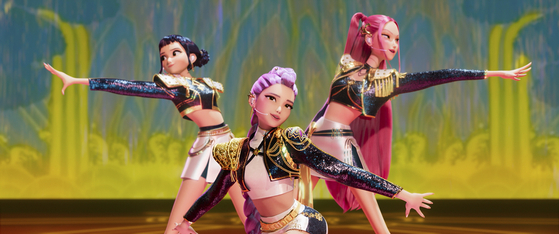 This image released by Netflix shows characters Zoey, from left, Rumi and Mira in a scene from ″KPop Demon Hunters.″ [AP/YONHAP]