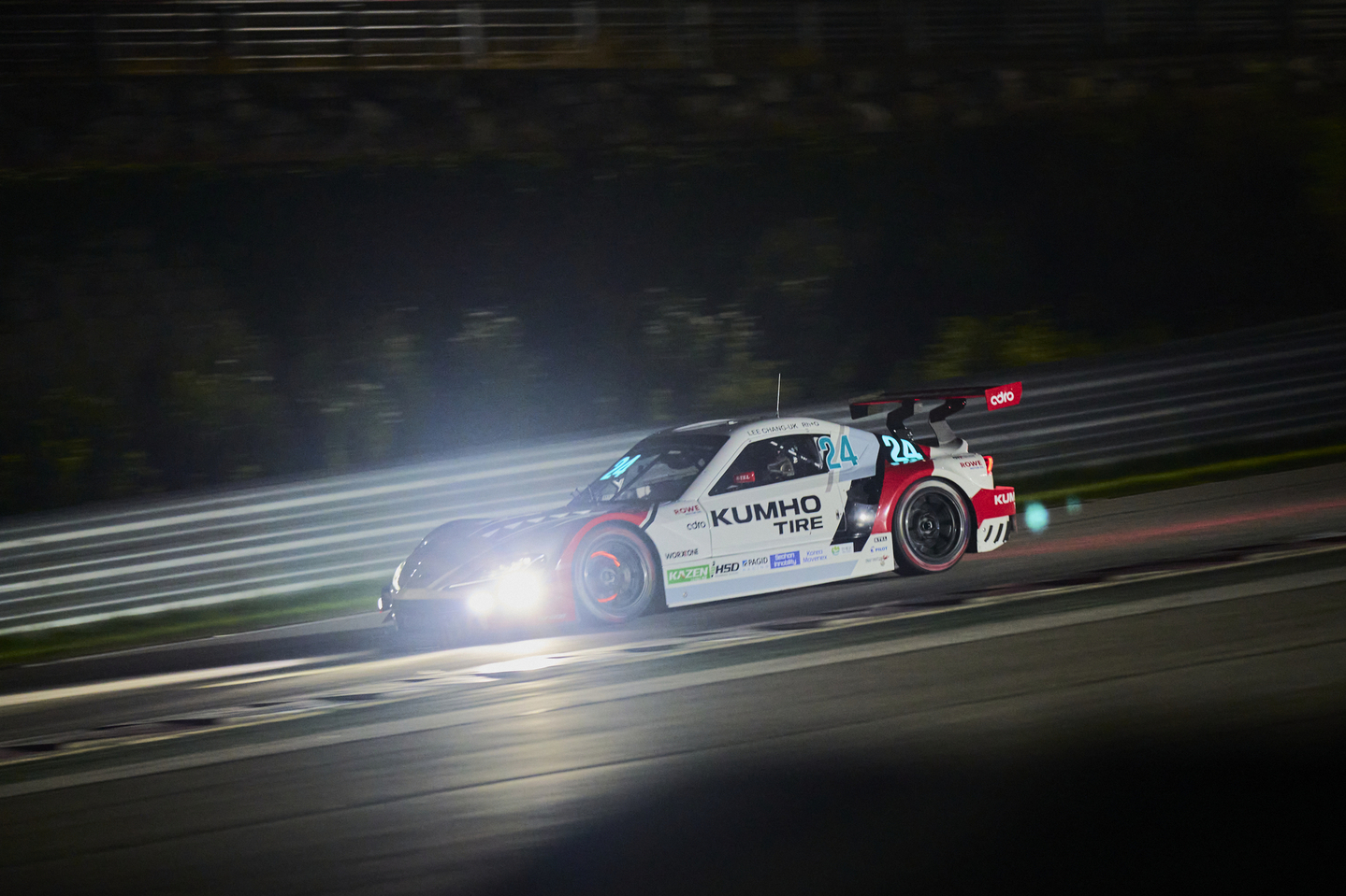 A race car speeds along the track during the Superrace Championship night race at Inje Speedium in Gangwon on Aug. 9. [SUPERRACE]         