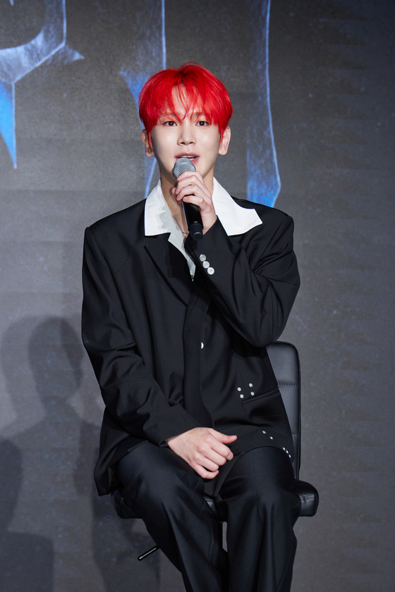 SHINee's Key speaks during a press conference ahead of the release of his third full-length album, ″Hunter,″ in eastern Seoul on Aug. 11. [SM ENTERTAINMENT]