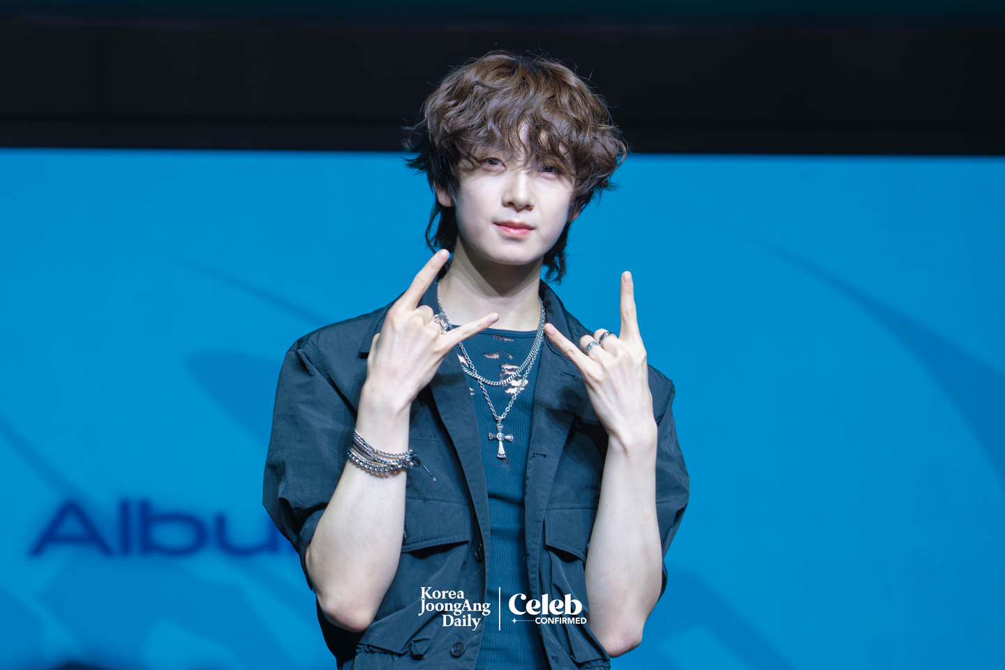 Ampers&One’s Kyrell poses for photos during a showcase for the release of the band’s third EP, "Loud & Proud," at the Sky Art Hall in western Seoul on Aug. 12. [DANIELA GONZALEZ PEREZ]