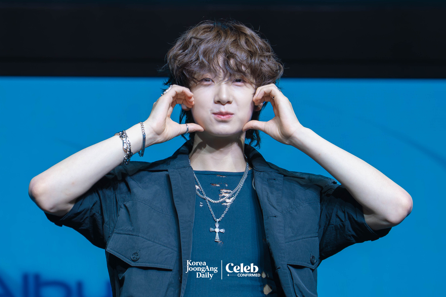 Ampers&One’s Kyrell poses for photos during a showcase for the release of the band’s third EP, "Loud & Proud," at the Sky Art Hall in western Seoul on Aug. 12. [DANIELA GONZALEZ PEREZ]