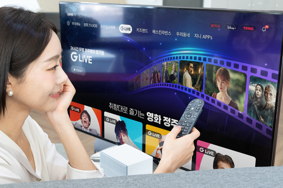A person browses films and television series to stream on a television set on May 28. [NEWS1]
