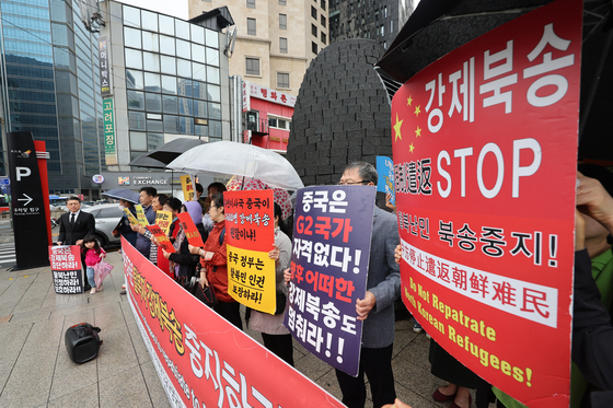 Representatives from civic groups hold a press conference in Myeong-dong, central Seoul, on May 6, 2024, urging China to stop the forced repatriation of North Korean defectors.[YONHAP]