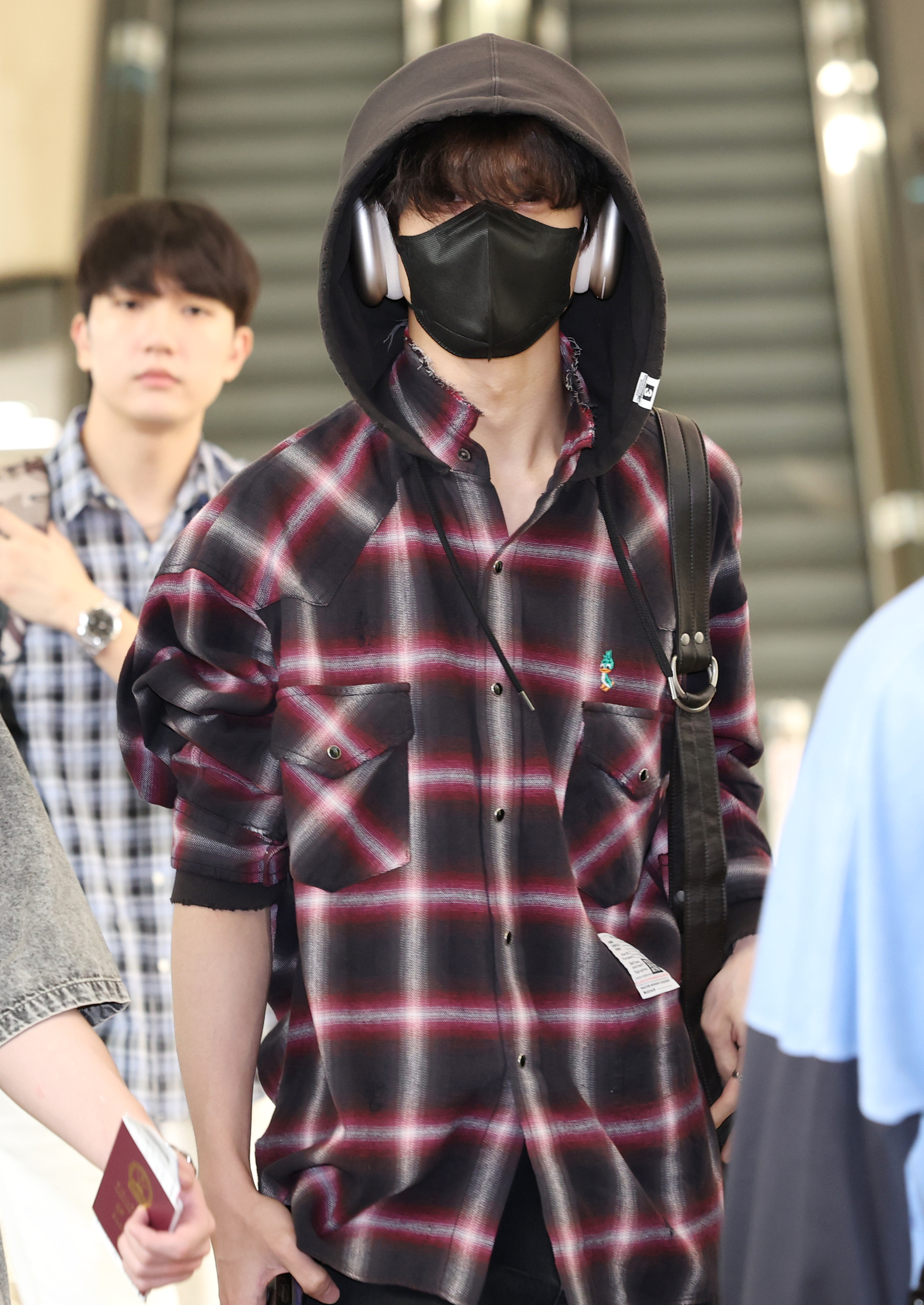 NCT member Jisung is seen on his way to Tokyo, Japan, for the SMTown 2025 Live concert at Gimpo International Airport in western Seoul on Aug. 8.
