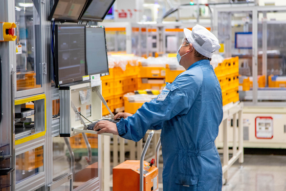A LG Energy Solution employee works at the company's battery plant in Holland, Michigan. [LG ENERGY SOLUTION]