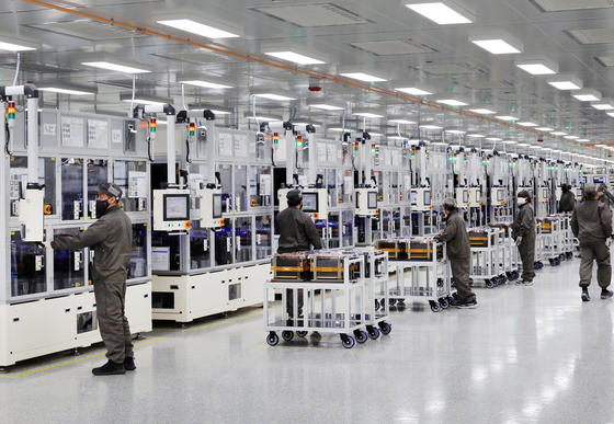 SK On engineers work at the company's battery plant in Georgia. [SK ON]