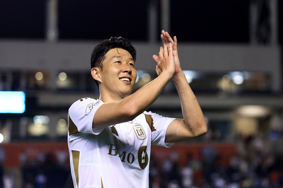 Los Angeles FC forward Son Heung-min greets the fans during an MLS match against Chicago Fire at SeatGeek Stadium in Bridgeview, Illinois, on Aug. 10. [AFP/YONHAP] 