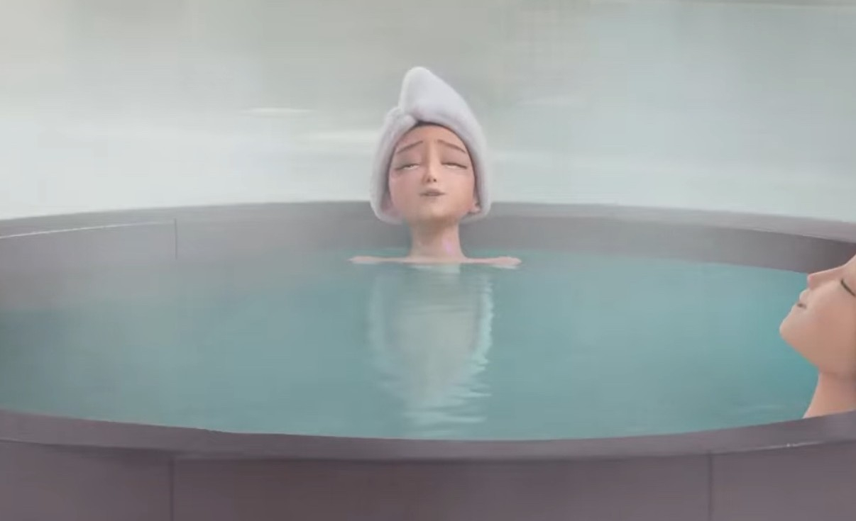 KPop Demon Hunters Rumi sinks into the bathhouse’s steaming waters. [SCREEN CAPTURE]