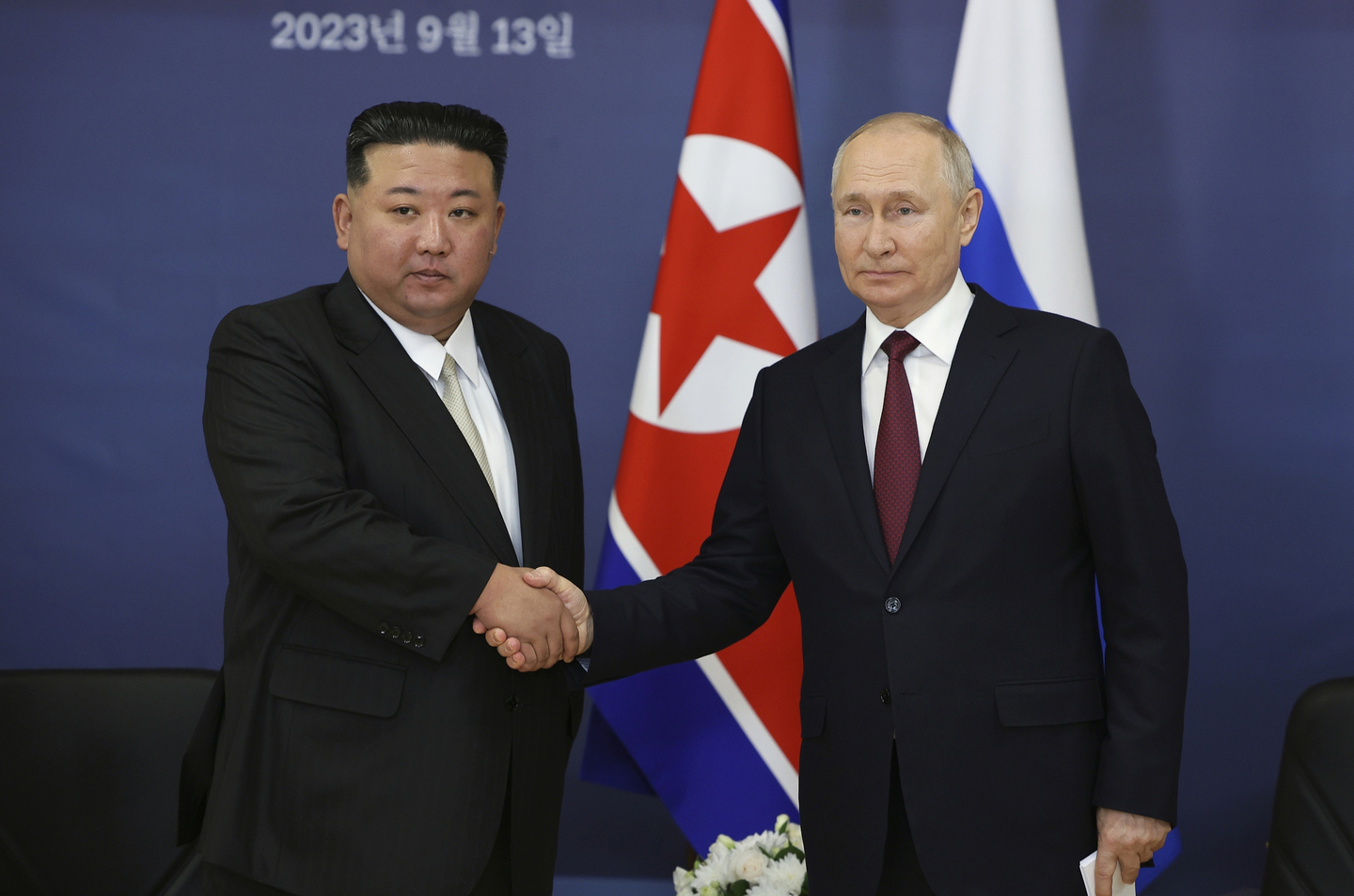 Russian President Vladimir Putin, right, and North Korean leader Kim Jong-un shake hands during their meeting at the Vostochny cosmodrome outside of Tsiolkovsky, in the far eastern Amur region of Russia on Sept. 13, 2023. [AP/YONHAP]