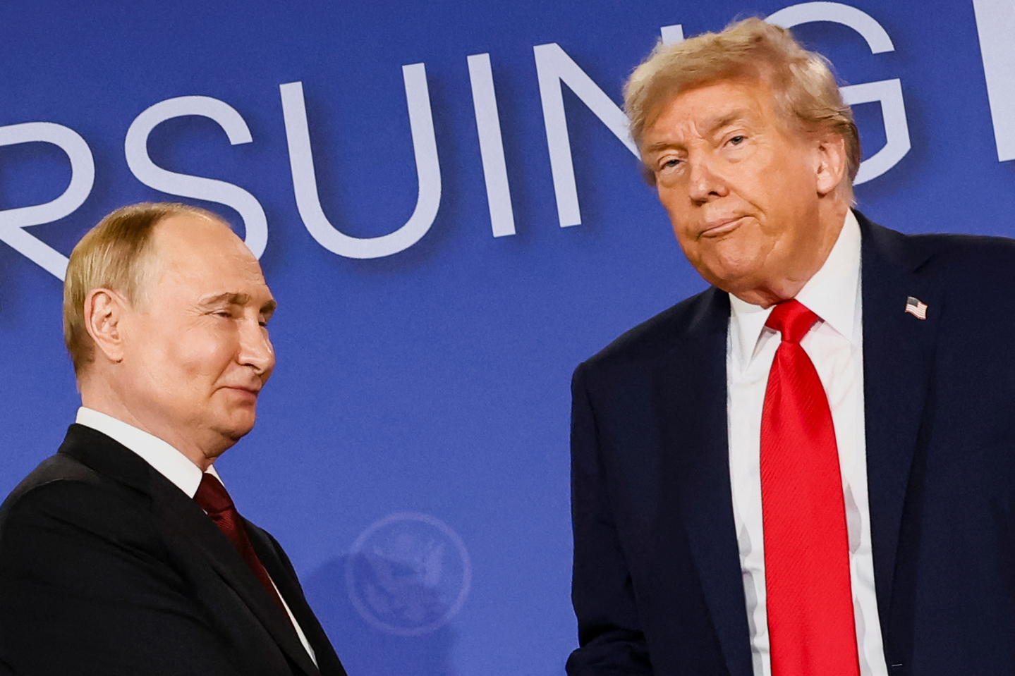 U.S. President Donald Trump, right, stands next to Russian President Vladimir Putin during a press conference in Anchorage, Alaska, on Aug. 15. [REUTERS/YONHAP] 