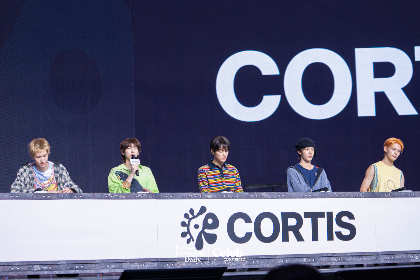 Boy band Cortis answers questions during a showcase for the release of the band’s first EP, ″Color Outside the Lines,″ at the Blue Square in central Seoul on Aug. 18. [DANIELA GONZALEZ PEREZ]