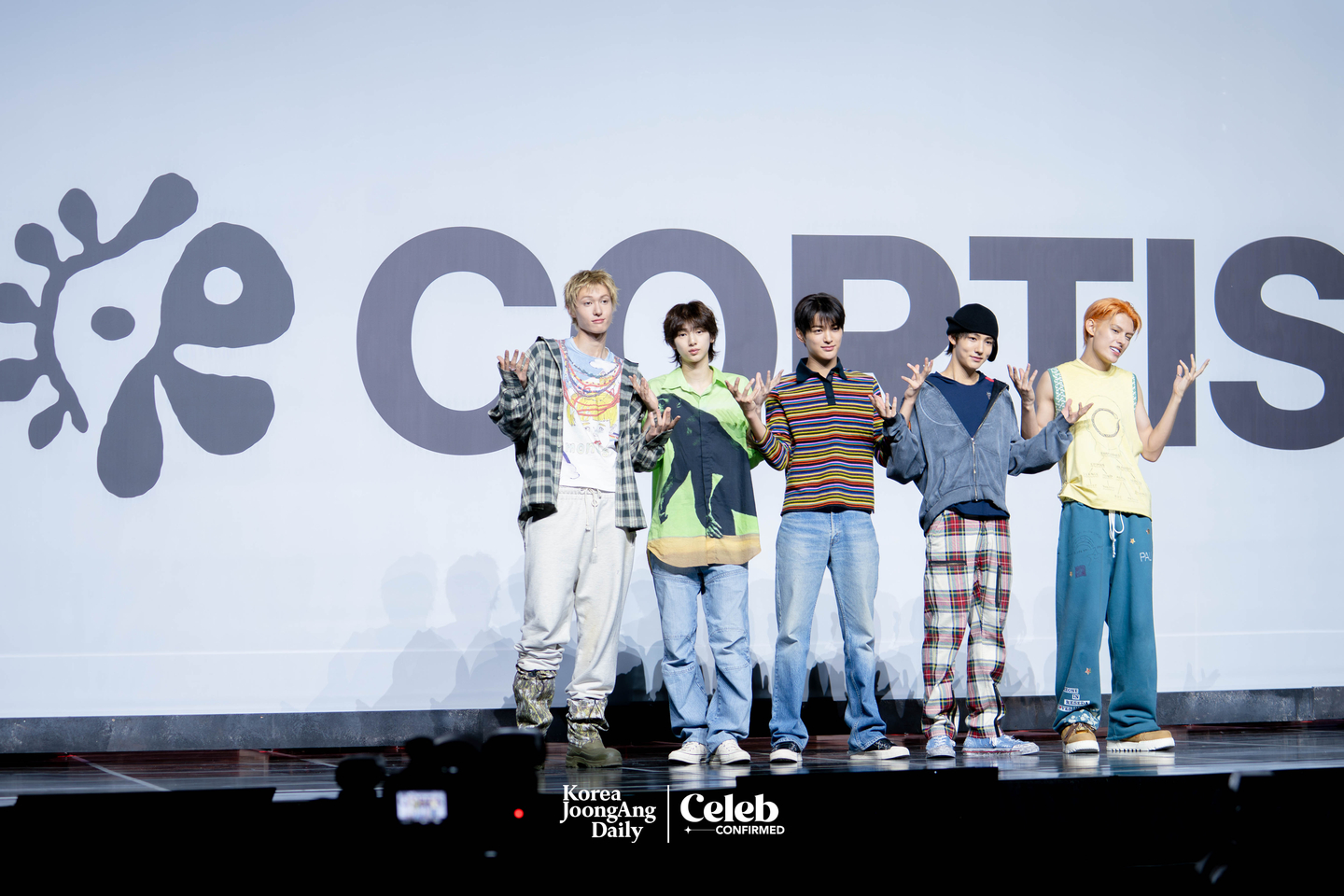 Boy band Cortis poses for photos during a showcase for the release of the band’s first EP, ″Color Outside the Lines,″ at the Blue Square in central Seoul on Aug. 18. [DANIELA GONZALEZ PEREZ]