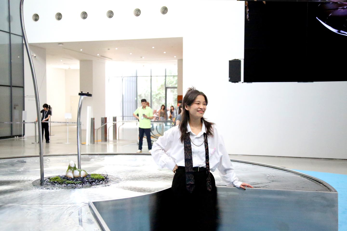 Artist Tzusoo poses with "Agarmon" displayed at the National Museum of Modern and Contemporary Art in Jongno District, central Seoul. [MMCA]