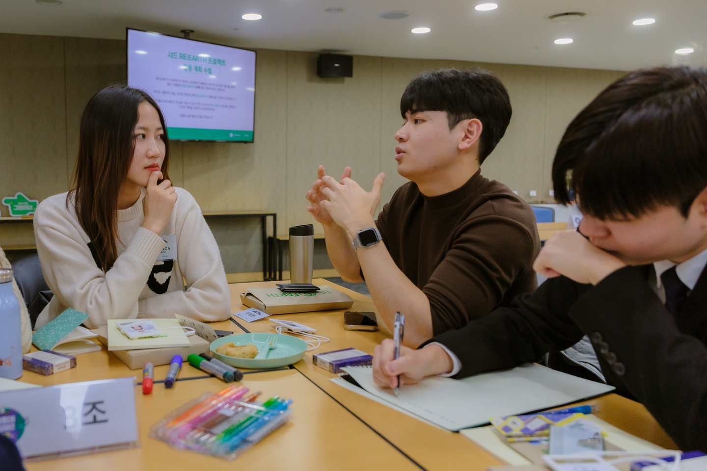 Ta Thi Thanh Nga talks with other students part of the Charlotte EcoDreamers program. [TA THI THANH NGA]