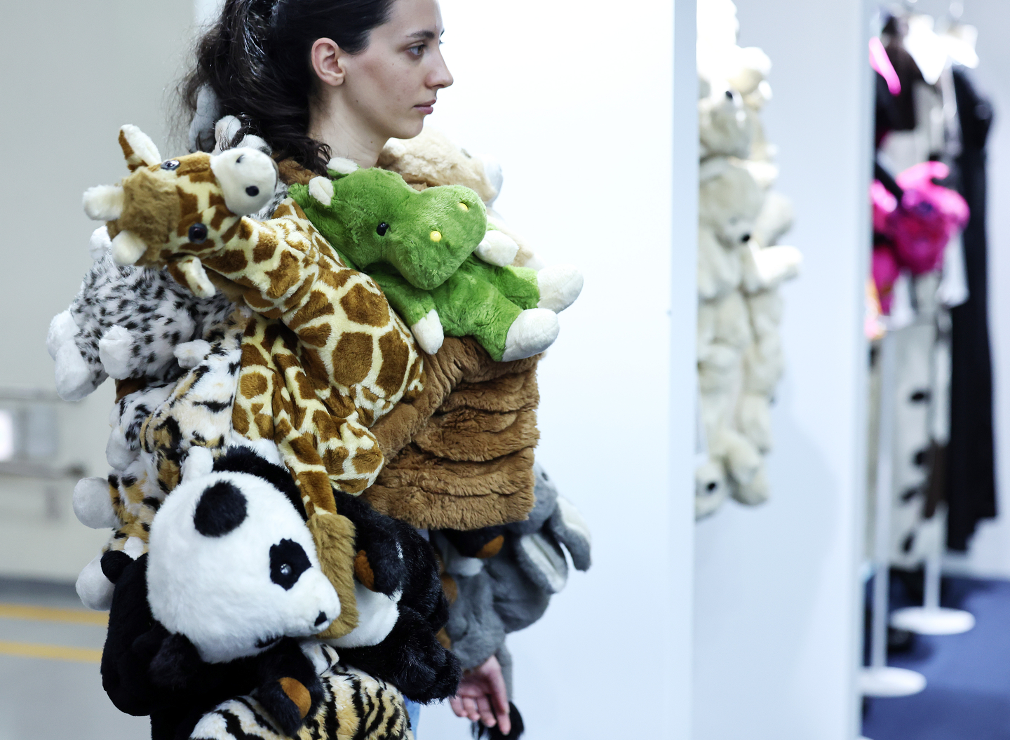 A model showcases a garment made from plush animal toys at Preview in Seoul 2025 (Seoul International Textile Fair), held at COEX in Gangnam District, southern Seoul, on August 20. [NEWS1]