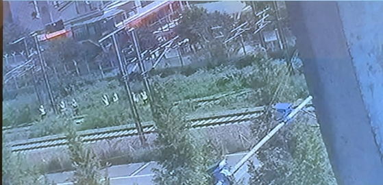 CCTV footage revealed on Aug. 20 shows workers immediately before they were hit by a Mugunghwa train on the Gyeongbu Line on Aug. 19, killing two and seriously injuring five. [YONHAP] 