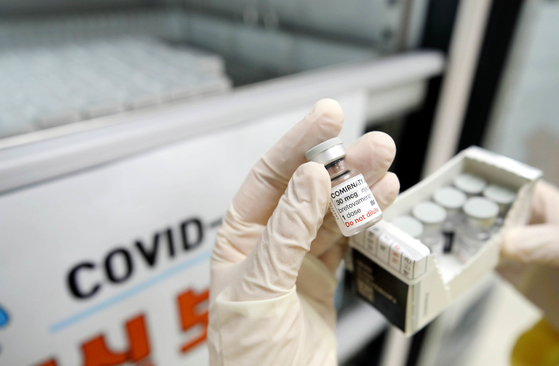 A medical worker checks Covid-19 vaccine supplies at a vaccination room in Buk District Health Center in Gwangju on June 16 in this photo provided by the city's Buk District Office. [NEWS1]