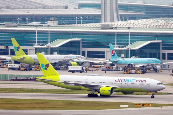 A Jin Air airplane is seen at Incheon International Airport on July 13. [YONHAP]