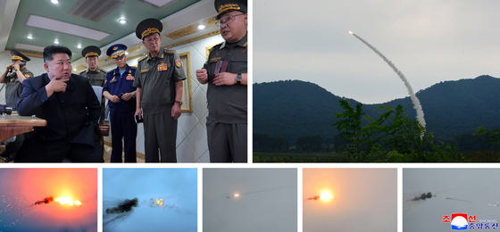 North Korea’s Missile Administration conducts test-firings of two newly developed surface-to-air missiles with improved performance against various targets to assess their combat capabilities in the presence of North Korean leader Kim Jong-un on Aug. 23, the Korean Central News Agency reports on Aug. 24. [YONHAP]