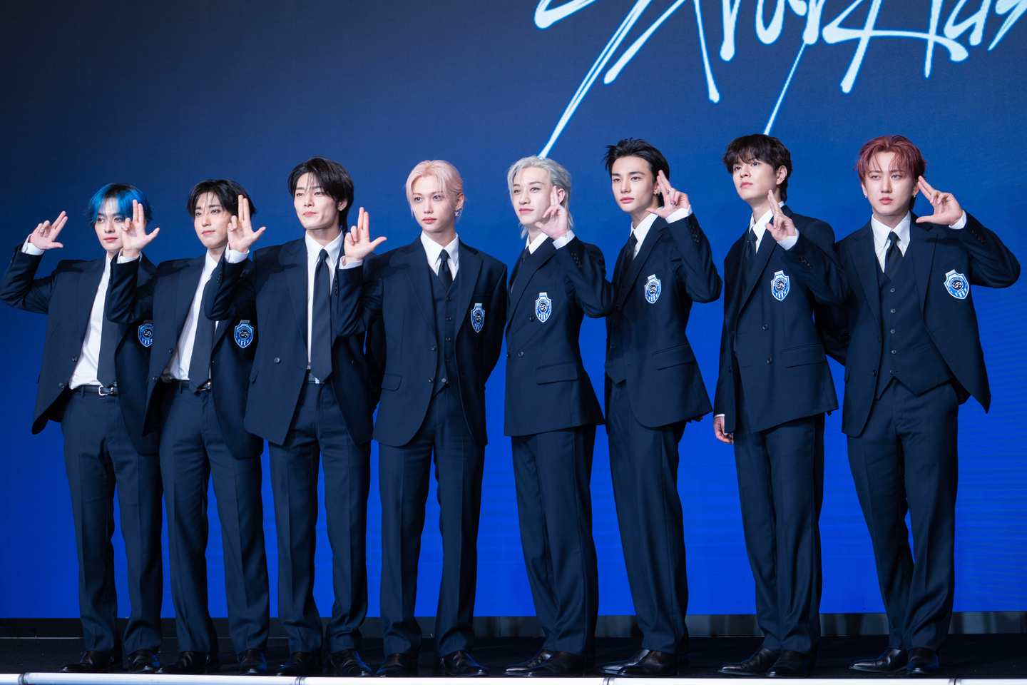 Stray Kids poses for photos during a press conference for its fourth full-length album, ″Karma,″ at Conrad Seoul in western Seoul on Aug. 22. [DANIELA GONZALEZ PEREZ]
