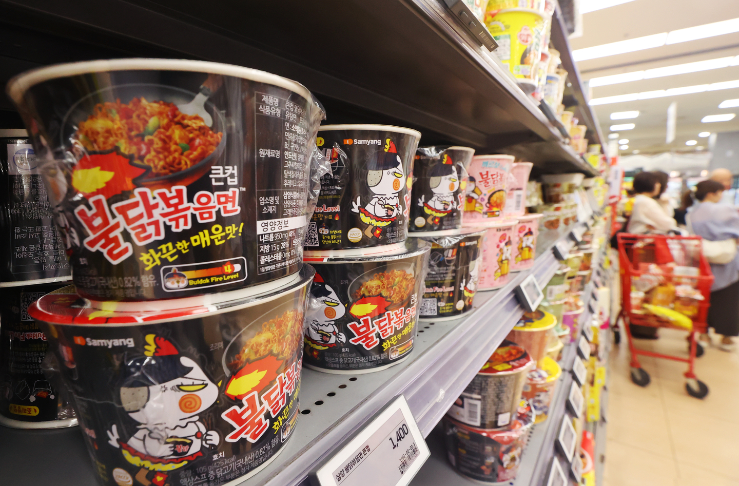 Buldak instant noodles are stocked on the shelves of a supermarket in Seoul on June 29. [YONHAP]