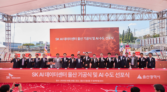 Participants pose for a photograph during SK Telecom and SK Ecoplant's groundbreaking ceremony for a new AI data center in Ulsan with Amazon Web Services and city officials on Aug. 29. [SK TELECOM] 
