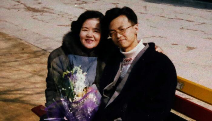 Cho Jung-pil, who was murdered at a Burger King restaurant in Itaewon, central Seoul, on April 3, 1997, smiles next to his mother Lee Bok-su, left, in a 1994 photograph that she provided to the media after his death. [LEE BOK-SU]