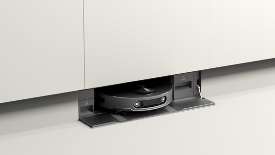 A robot vacuum cleaner is seen during a design fair on Aug. 28. The product in this photo is unrelated to the article. [NEWS1]