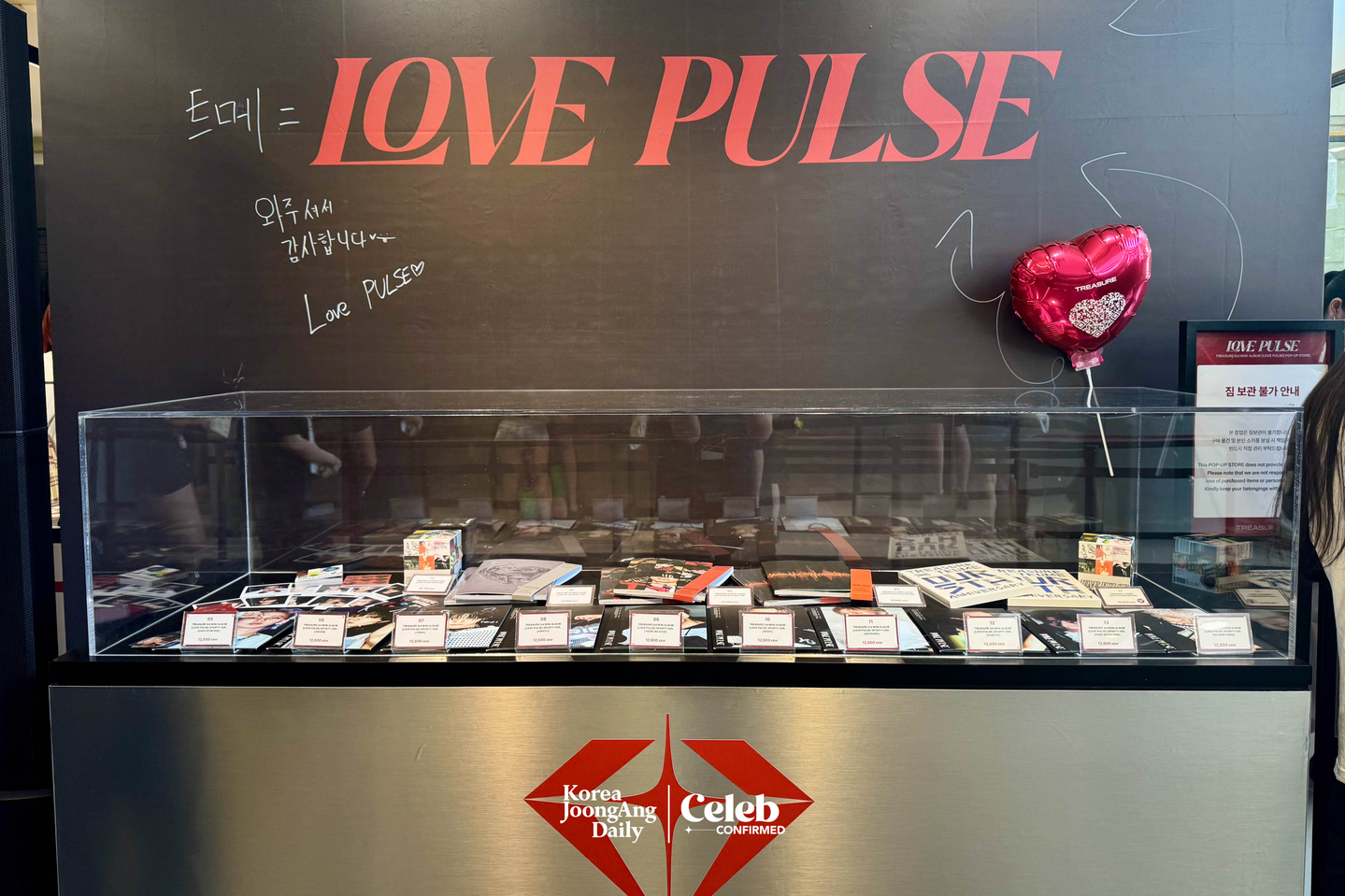 Merchandise at Treasure’s pop-up store for its new album “Love Pulse” at Star Square in western Seoul. [DANIELA GONZALEZ PEREZ]
