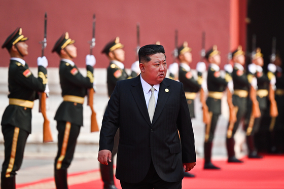 North Korea's leader Kim Jong-un arrives for a military parade marking the 80th anniversary of victory over Japan and the end of World War II in Beijing on Sept. 3. [TASS/YONHAP]