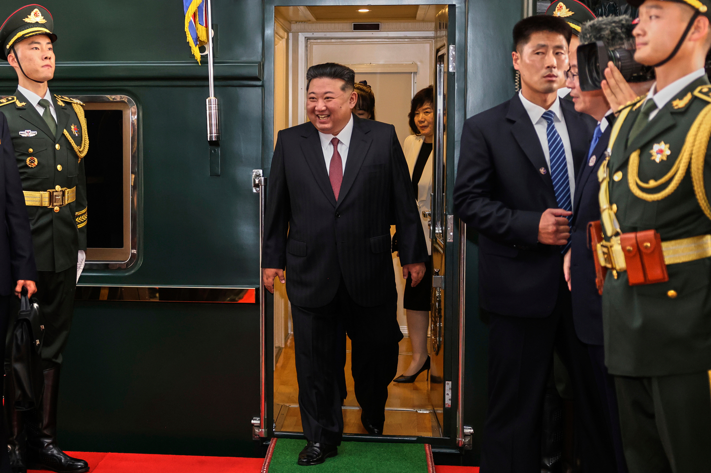 North Korean leader Kim Jong-un disembarks from a train as he arrives at a railway station, in Beijing, China, on Sept. 2. [AP/YONHAP]