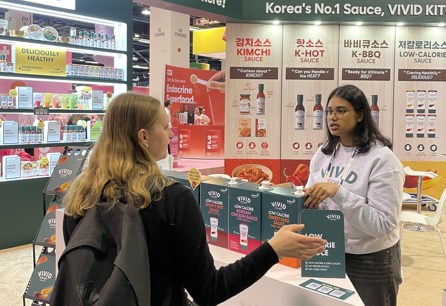 Vivid Kitchen sauces are showcased by Dongwon Home Food at the Natural Products Expo West in Anaheim, California, last March. [DONGWON HOME FOOD]