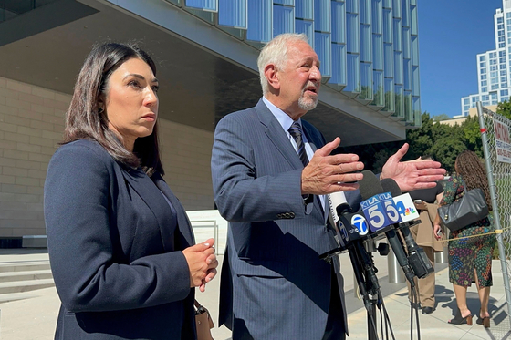 Attorneys Alexandra Kazarian and Mark Geragos address reporters outside of federal court on Sept. 3 in Los Angeles, after their client, Jasveen Sangha, pleaded guilty to giving the ketamine to Matthew Pery that led to the actor's 2023 overdose death. [AP/YONHAP]