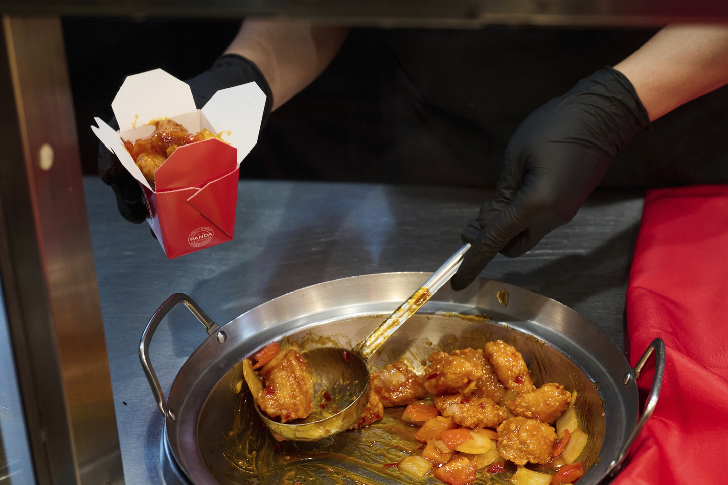 Panda Express announces its new Dynamite Sweet & Sour Chicken. The dish, a collaboration with Samyang's Buldak brand, combines crispy chicken with a sauce inspired by Buldak's signature fiery flavor, making it the spiciest menu item to date offered by the American Chinese chain. The limited-time offering is available in select markets across the country while supplies last. Taken on Tuesday, Aug. 5 in New York. [AP/YONHAP]