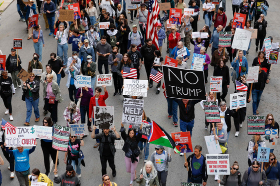People participate in a demonstration against the planned deployment of National Guard troops in Chicago on Sept. 6. [AFP/YONHAP]