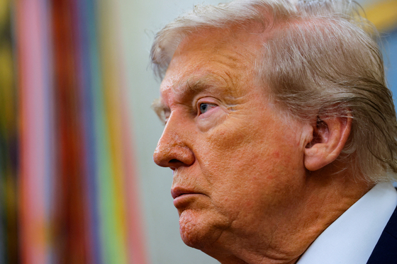 U.S. President Donald Trump looks on during an event to announce that the Space Force Command will move from Colorado to Alabama, in the Oval Office at the White House in Washington on Sept. 2. [REUTERS/YONHAP]