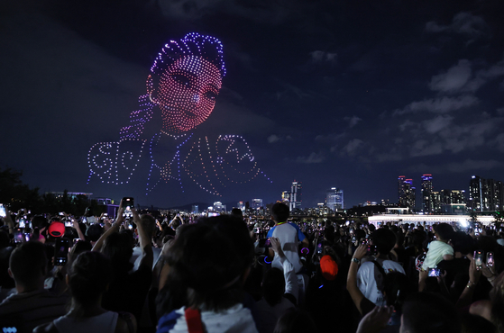 Rumi of HUNTR/X from Netflix's animated film "KPop Demon Hunters" appears in the night sky during the “2025 Hangang Drone Light Show” at Ttukseom Hangang Park in eastern Seoul on Sept. 7. [NEWS1]
