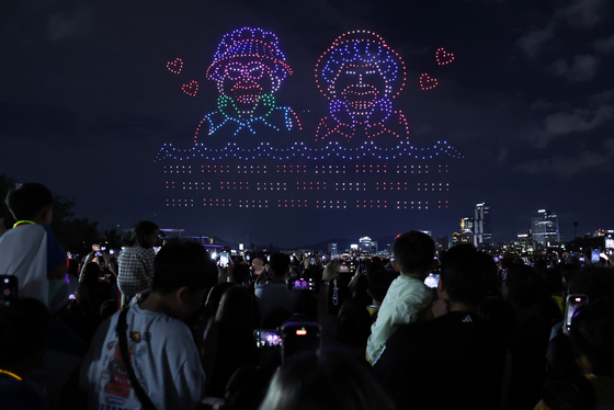 A scene from Netflix's animated film "KPop Demon Hunters" appears in the night sky during the “2025 Hangang Drone Light Show” at Ttukseom Hangang Park in eastern Seoul on Sept. 7. [NEWS1]