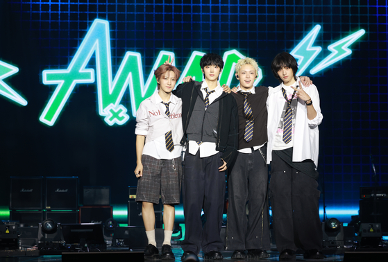 AxMxP, the newest boy band from FNC Entertainment, poses for a photo at the showcase for the band's debut album at Olympic Hall in Gangseo District, western Seoul, on Sept. 10. [NEWS1] 