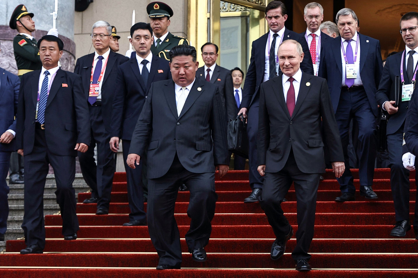 In this pool photograph distributed by the Russian state agency Sputnik, Russia's President Vladimir Putin (center R) and North Korea's leader Kim Jong-un (center L) leave after their meeting in Beijing on September 3, 2025. Putin on September 3 thanked Kim for sending troops to oust Ukrainian soldiers from Russia's Kursk border region, saying they fought ″heroically″. [AFP/YONHAP]