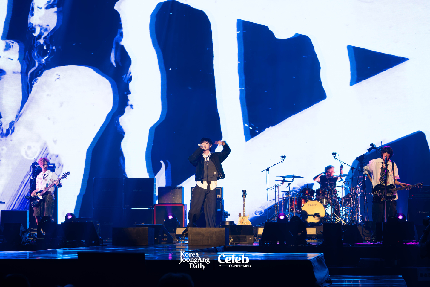 Rock band AxMxP performs lead track “I Did It” during a showcase for the release of its first full-length album, “AxMxP,” at Olympic Hall in southern Seoul on Sept 10. [DANIELA GONZALEZ PEREZ]