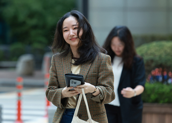 Min Hee-jin, former CEO of girl group NewJeans' agency ADOR, appears at the Seoul Central District Court in Seocho District, southern Seoul, on Sept. 11. [YONHAP]