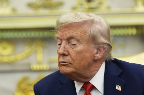 President Donald Trump listens during a meeting with Korean President Lee Jae Myung in the Oval Office of the White House in Washington on Aug. 25. [AP/YONHAP]