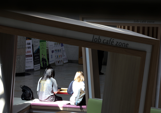 Young people sit at a job center in Seoul on Sept. 10. [YONHAP]