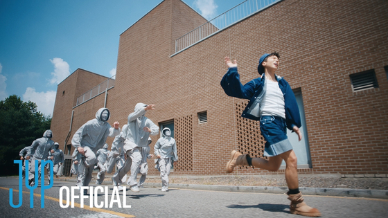A teaser image for the music video to Jang Woo-young's ″Think Too Much,″ the lead track for his third EP, ″I'm into″ [JYP ENTERTAINMENT]