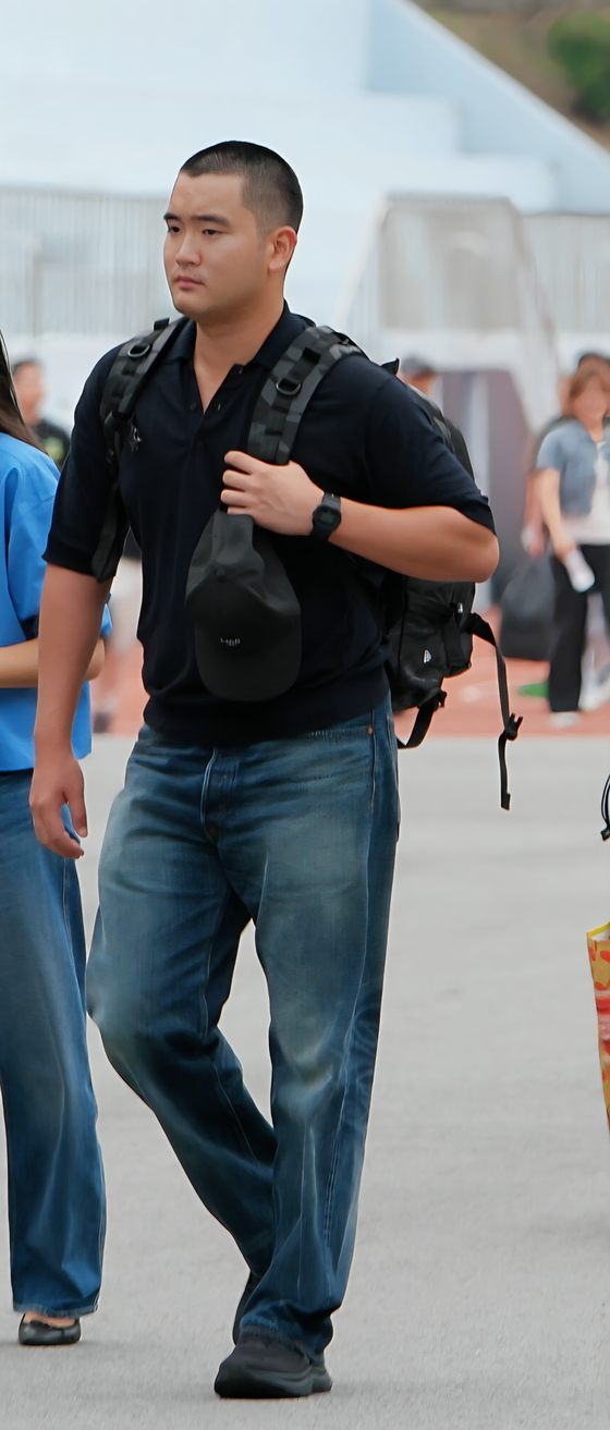 25-year-old Lee Ji-ho, the eldest son of Samsung Electronics' Executive Chairman Lee Jae-yong, begins his mandatory military service as an officer candidate at the Naval Academy on Sept. 15 in Changwon, South Gyeongsang. [SAMSUNG ELECTRONICS]