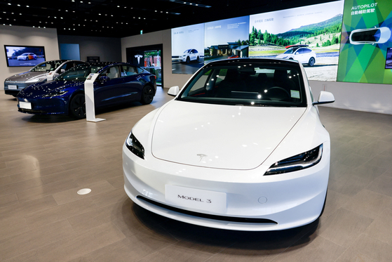 A Tesla model 3 is pictured inside a showroom in Taipei, Taiwan, on July 31. [REUTERS/YONHAP]